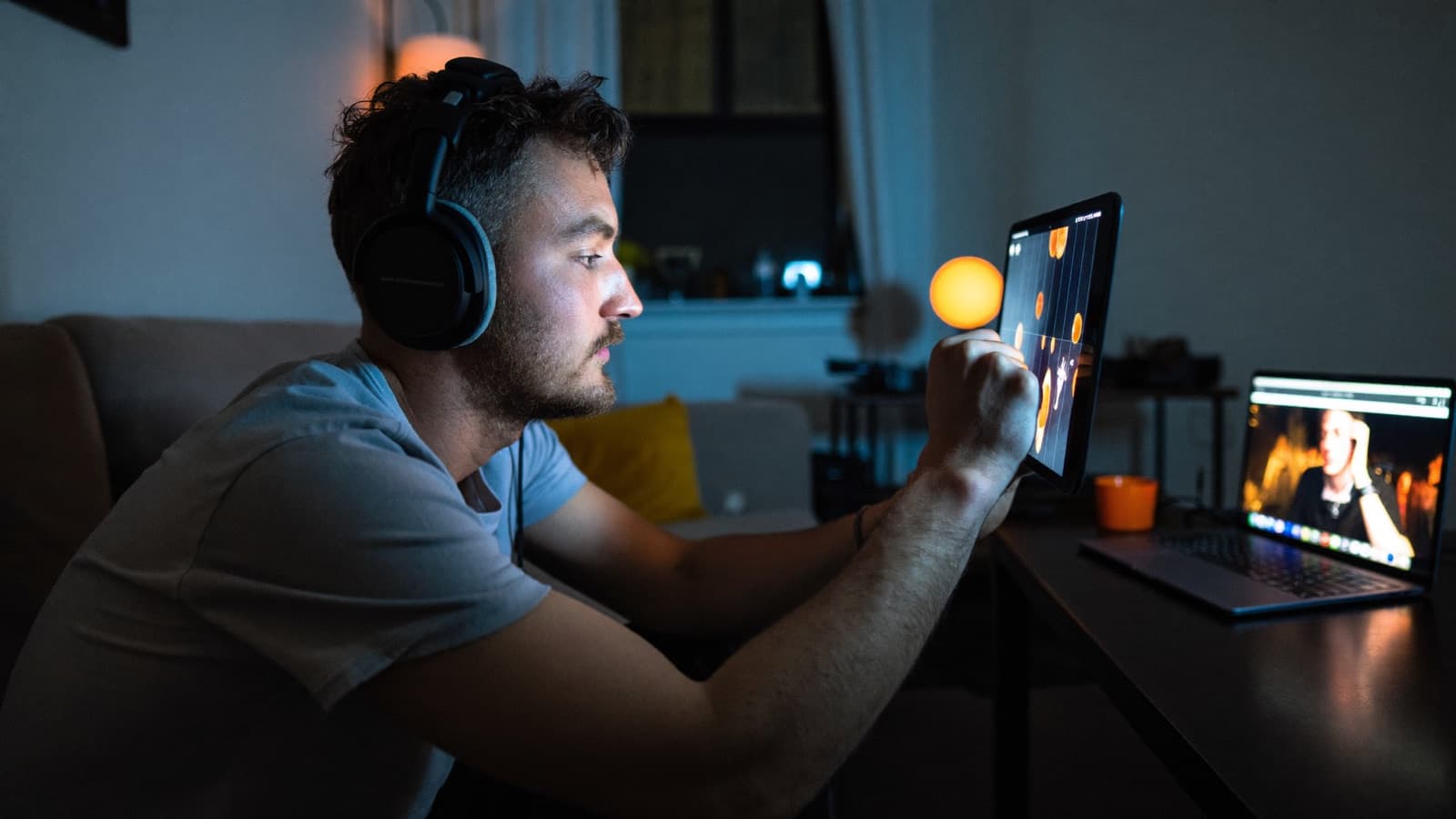 A producer running a live show from a tablet